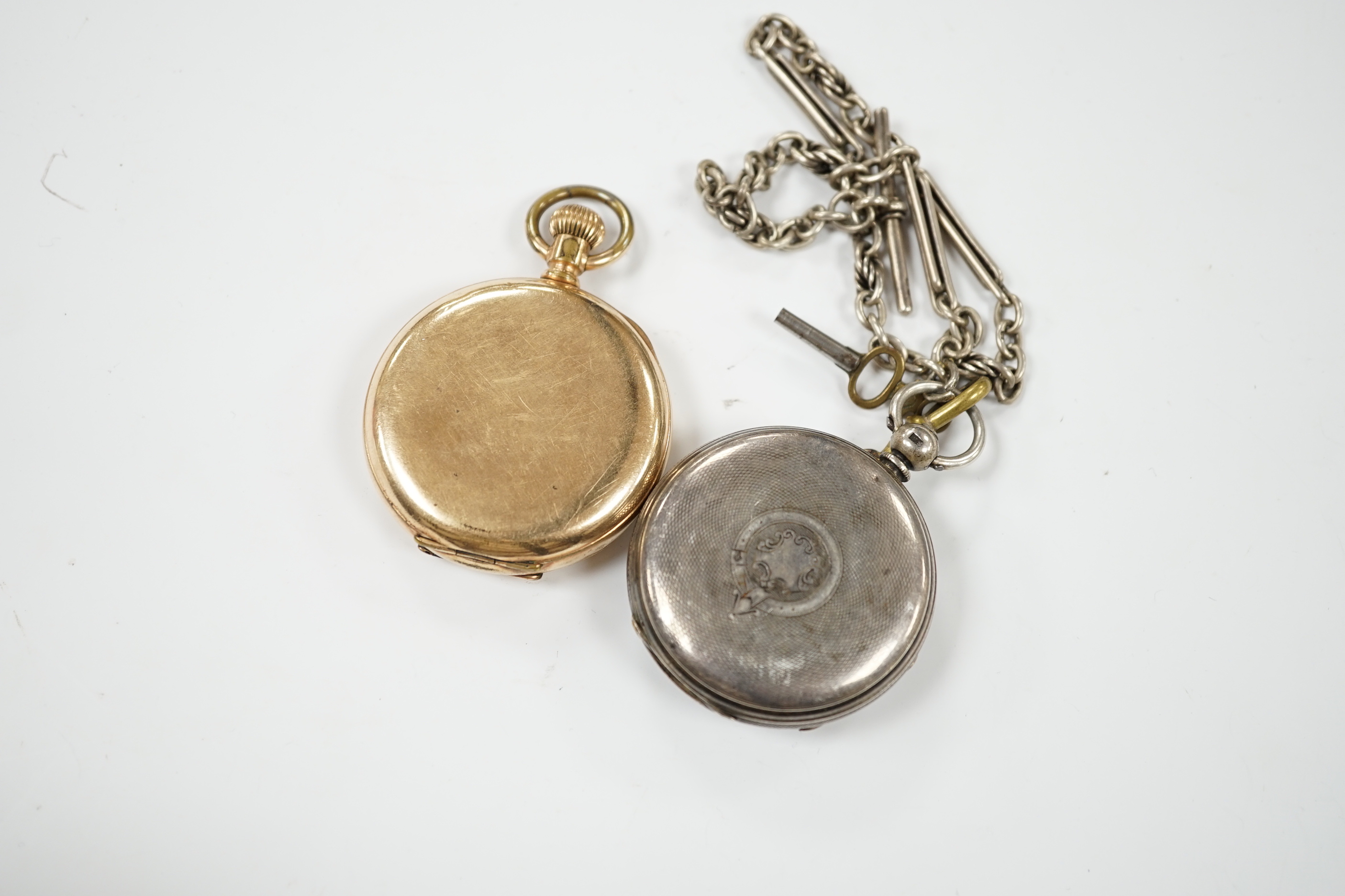 A 1920's silver open face pocket watch and a gold plated hunter pocket watch.